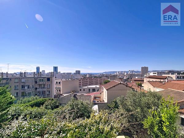 A VENDRE MARSEILLE 13014 MAISON T4 AVEC JARDIN ET CAVE AMENAGEE EN T3