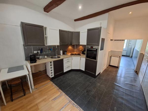 Duplex de caractère à Saint-Marcel : une belle opportunité à saisir