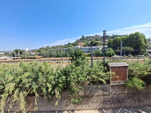 Duplex de caractère à Saint-Marcel : une belle opportunité à saisir