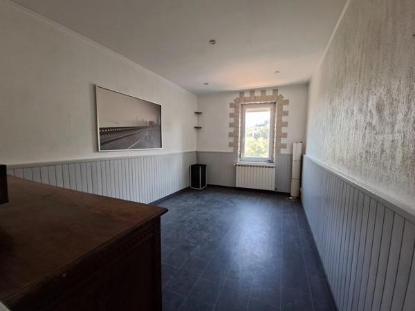 Duplex de caractère à Saint-Marcel : une belle opportunité à saisir