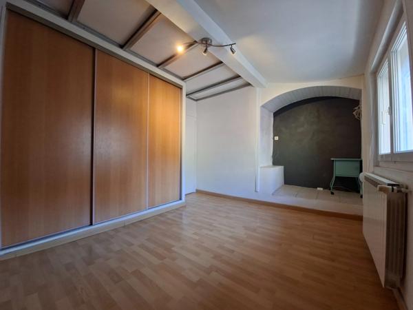 Duplex de caractère à Saint-Marcel : une belle opportunité à saisir
