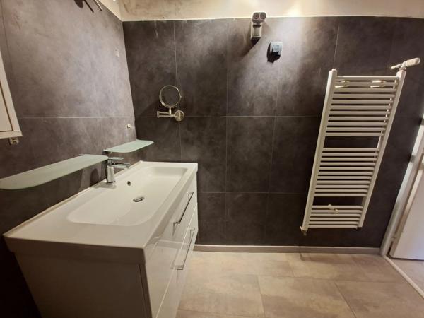 Duplex de caractère à Saint-Marcel : une belle opportunité à saisir