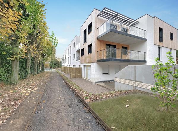 Élégant T4 de 128 m² avec Extérieurs et Stationnements, proche Parc Barbieux