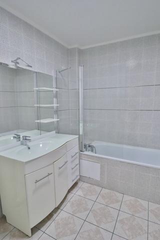 Appartement 4 pièces 83 m² – Garage + Cave + Parking + Ascenseur