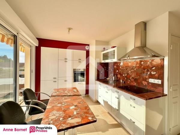 Appartement en toit-terrasse avec 48 m2 d'extérieur, double garage, cave