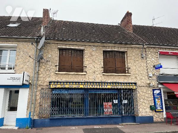 Immeuble à usage mixte : commerce et habitation