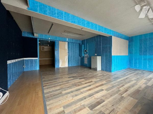 Immeuble à usage mixte : commerce et habitation