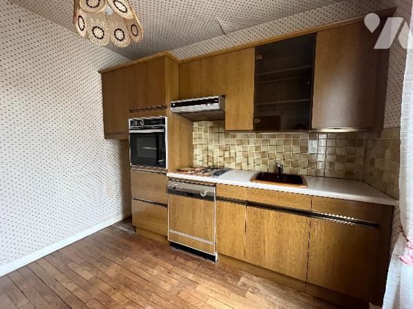 Immeuble à usage mixte : commerce et habitation