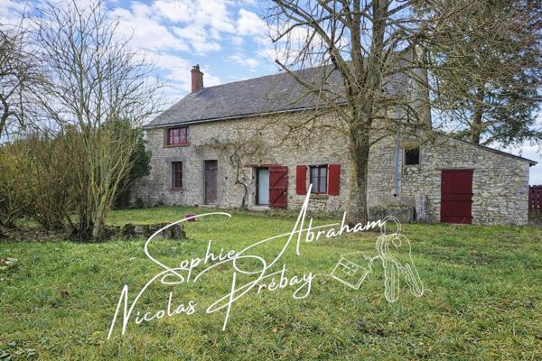 Maison à rénover avec grange attenante et grand terrain