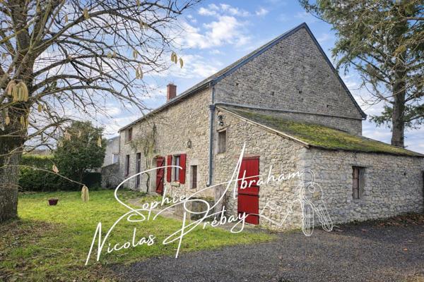 Maison à rénover avec grange attenante et grand terrain