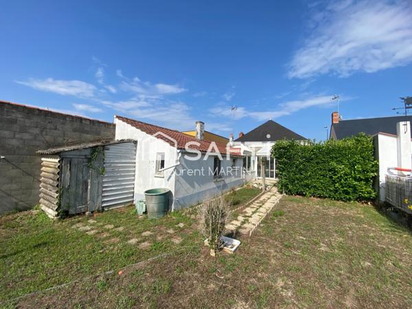 Maison de Centre Ville avec Garage et Jardin
