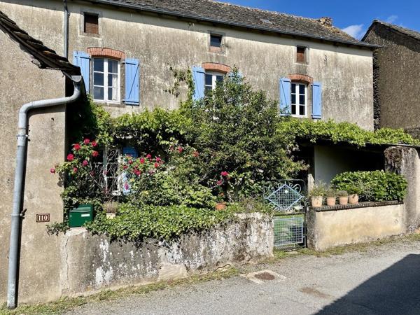 Maison de charme avec dépendances et grand terrain.