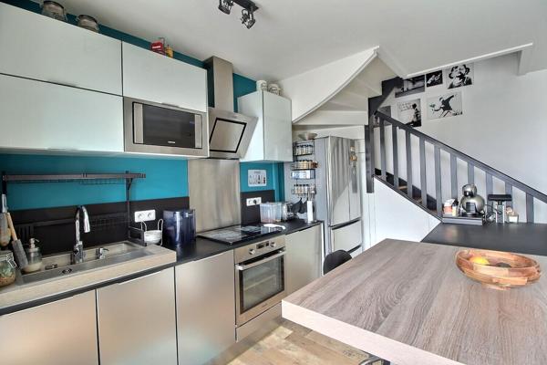 Appartement  en duplex  de type 2 pièces 54.03 utiles (51.23 m² carrez)  revisité en grand F2 représentant 54.03 m² utiles