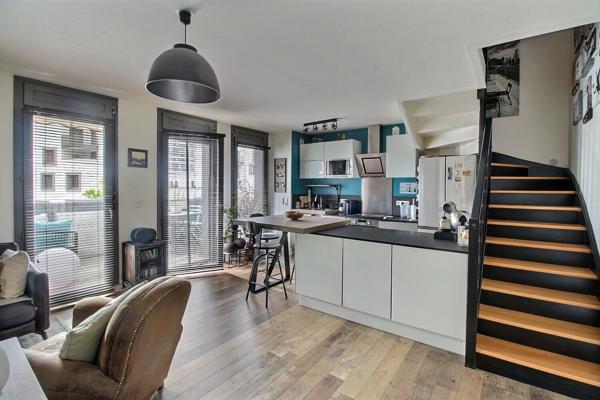 Appartement  en duplex  de type 2 pièces 54.03 utiles (51.23 m² carrez)  revisité en grand F2 représentant 54.03 m² utiles