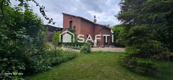 Belle Demeure de 10pièces avec écuries, garage, atelier avec studio au dessus, 2 terrasses, jardins clos arbore, stationnements au calme.