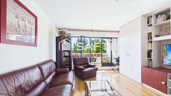 T3 avec Balcon, ascenseur, cave et place de parking