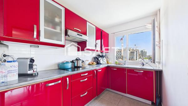 T3 avec Balcon, ascenseur, cave et place de parking
