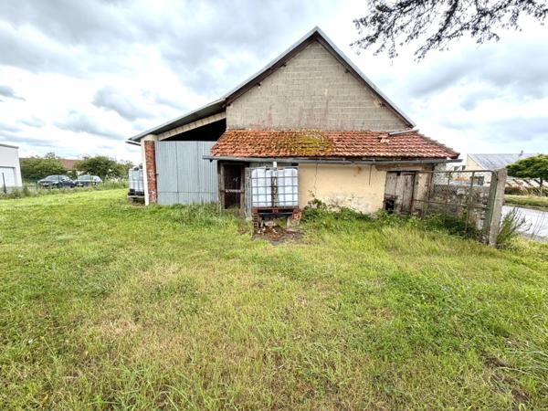Maison en pierre de 111 m² avec garage, dépendance et terrain de 1 374 m² – Fort potentiel MOON SUR ELLE (50)