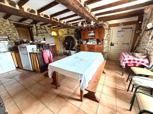 Maison en pierre de 111 m² avec garage, dépendance et terrain de 1 374 m² – Fort potentiel MOON SUR ELLE (50)