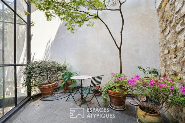 Loft avec verrière aux allures d’atelier d’artiste sur cour et terrasse – Jardin des Plantes