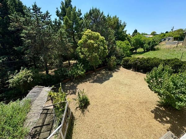 Carcassonne maison traditionnelle 129 m² 4 chambres terrain 1 100 m² sous-sol garages jardin arboré chauffage gaz