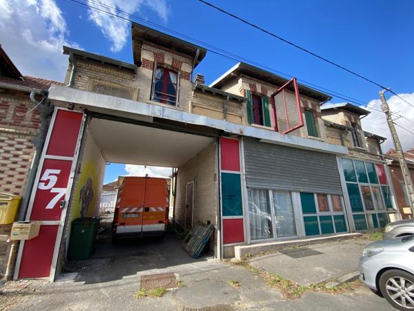 Entrepôt professionnel 800 m2 + maison habitation