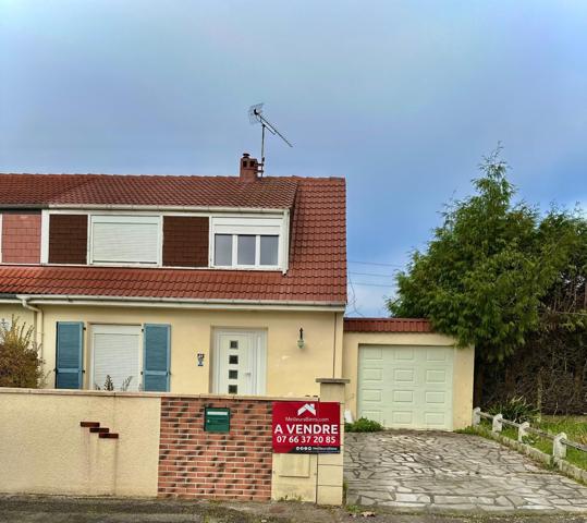 Charmante maison  de 4 pièces avec sous-sol garage et terrain de 498m²