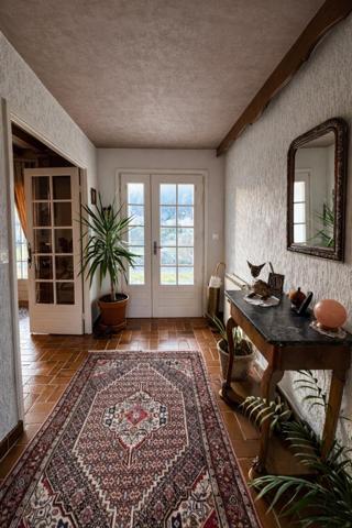 Maison de caractère avec beau potentiel