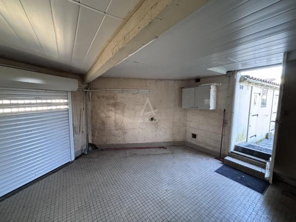Maison à étage de 3 chambres avec garage et jardin