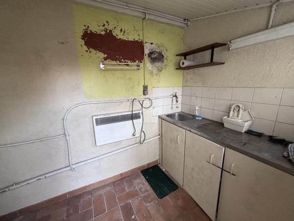 Maison à étage de 3 chambres avec garage et jardin