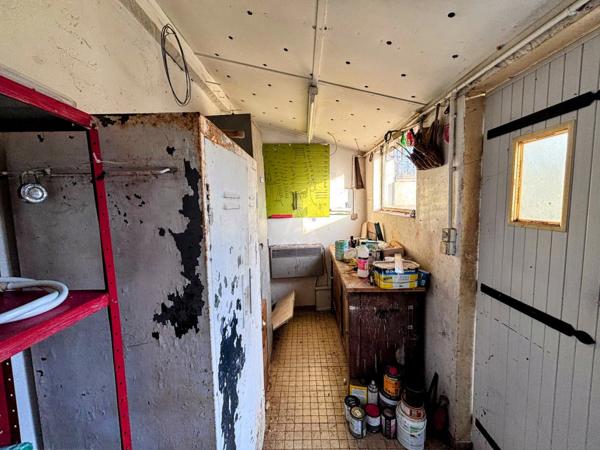 Maison à étage de 3 chambres avec garage et jardin