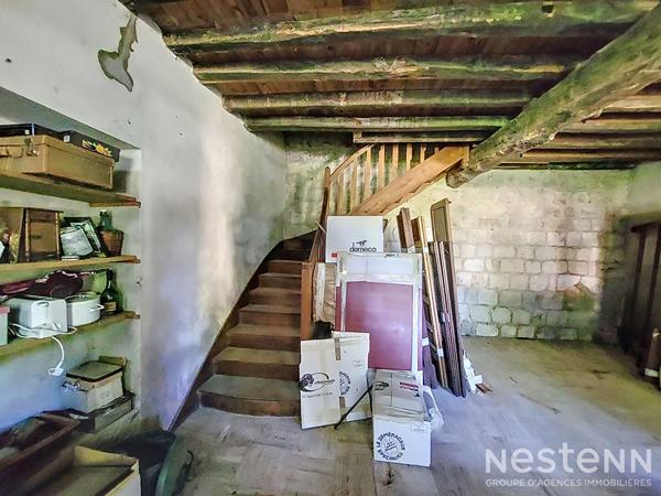 A Vendre Maison en pierre mitoyenne de 165 m² avec jardin proche du centre-ville