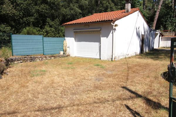 Maisonnette en secteur boisé