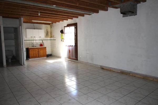 Maisonnette en secteur boisé