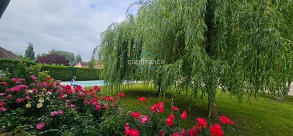 Maison d’architecte avec un jolie terrain arboré