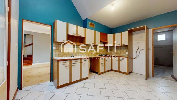 Maison familiale avec jardin, garage et terrasse