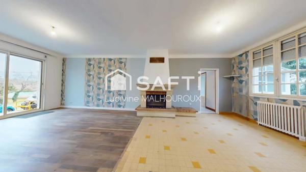 Maison familiale avec jardin, garage et terrasse