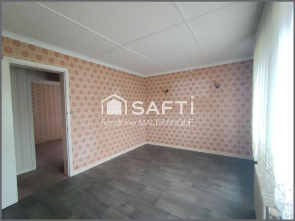 Maison individuelle avec garage et jardin