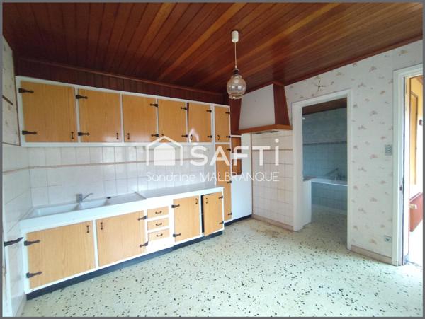 Maison individuelle avec garage et jardin