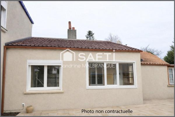 Maison individuelle avec garage et jardin