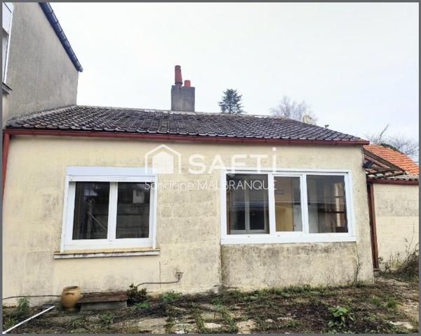 Maison individuelle avec garage et jardin