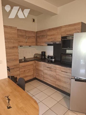 Appartement en rez-de-chaussée proche du centre-ville