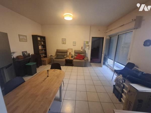Appartement en rez-de-chaussée proche du centre-ville
