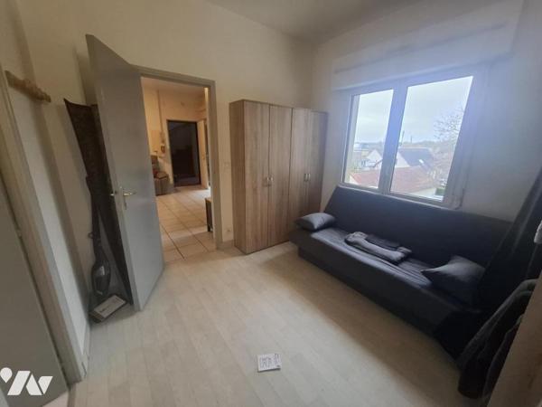 Appartement en rez-de-chaussée proche du centre-ville