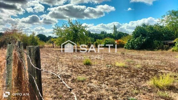Un terrain clos non constructible, de loisir avec eau de la ville puits et arbres