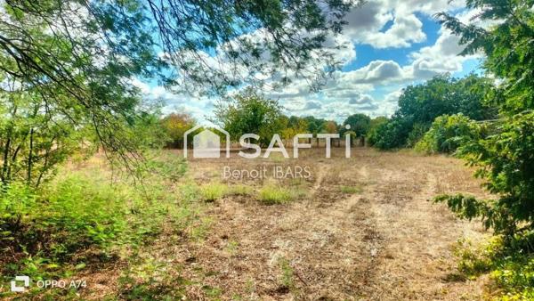 Un terrain clos non constructible, de loisir avec eau de la ville puits et arbres
