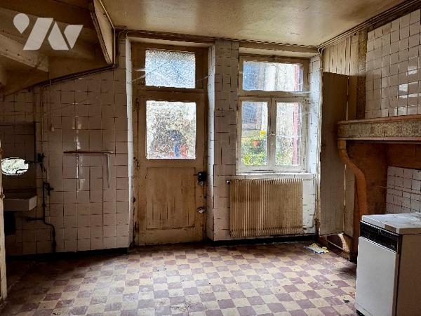 Maison mitoyenne à rénover