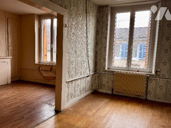 Maison mitoyenne à rénover