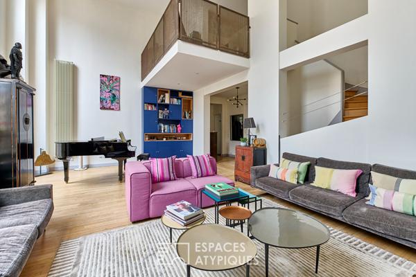 Duplex esprit loft avec séjour cathédrale et studio indépendant – Auteuil Sud