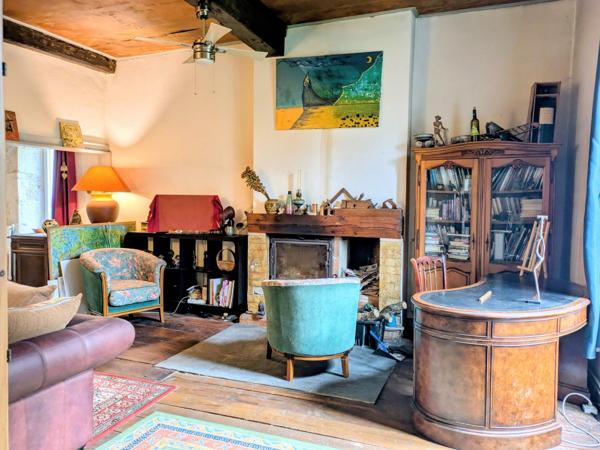 Ferme de caractère avec dépendances et beau potentiel